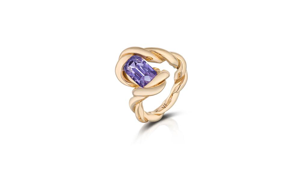 Vanessa Fernández Studio in Miami, Florida designed by Vanessa Fernández. A hand-crafted ring in 18-karat yellow gold that twists around an elongated cushion-cut 3.04-carat Vietnamese lavender spinel ($30,000) Vanessa Fernández Studio Ring